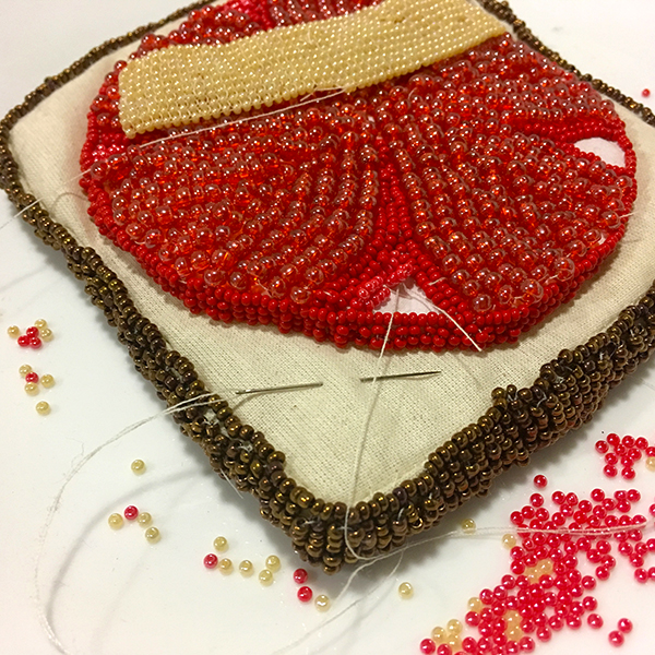 sculpture of tomato and cheese sandwich made from fabric and glass seed beads. Link to Mable and Beverly and Liza and Rachel.