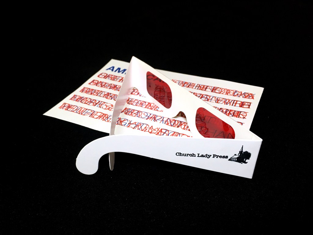 laser print in the design of an abstract American Flag. Blue text at the top left reads "America:" 6 red stripes are made from layers of red text printed on top of each other until illegible. red secret decoder glasses with a stamp that reads "Church Lady Press" lays on top.